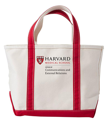 Example of a tote bag with HMS Office of Communications and External Relations branding embroidered on it